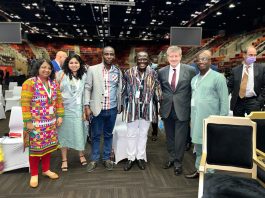 Mr Bright Wireko Brobby (in a green top and down attire) with other participants at the meeting