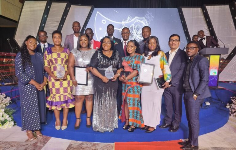 Staff of OlamAgri show off the AGI Award at the weekend.