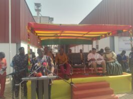 Mr Kyerematen handing over keys to the vehicle to the Board Chairman of the Factory 