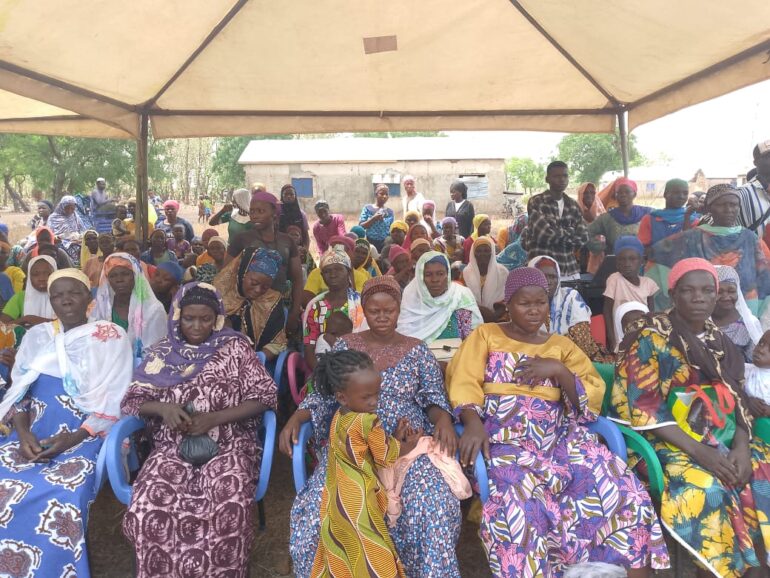 French Ambassador with some of the beneficiary women at the processing centre 