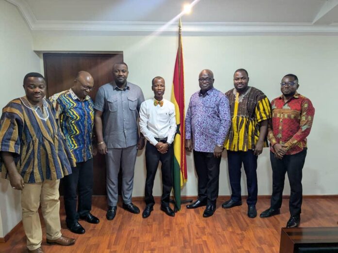 NaSTAG President Dr. Amos Rutherford Azinu (center) alongside Minister of Food and Agriculture, Mr. Eric Opoku (left) and Deputy Minister, Mr. John Dumelo (right) during a high-level meeting on the Feed Ghana programme. 