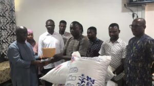 Dr Kusi and the beneficiaries and some participants 