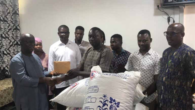 Dr Kusi and the beneficiaries and some participants 
