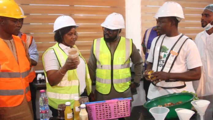 Dr Otokunor and officials of the factory 