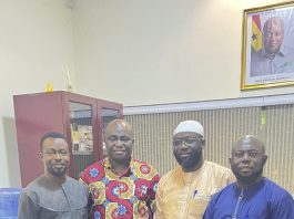 Mr Opoku (in African print) with officials from CLIP 