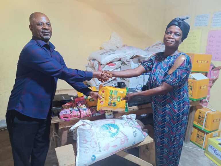 AORCYDC, Compassion International support 80 farmers with agrochemicals