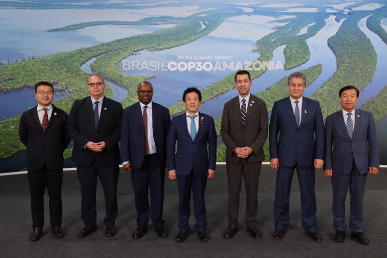 FAO's Delegation at COP30 (L-R): Mr Shen Hong, Assistant to DG; Mr Maximo Torero, Chief Economist; Mr Godfrey Magwenzi, Chief of Cabinet and DDG; FAO Director-General QU Dongyu (C); Mr Kaveh Zahedi, OCB Director; Jorge Meza FAO’s Representative in Brazil; Mr Zhimin Wu, NFO Director. ©FAO / Max Valencia