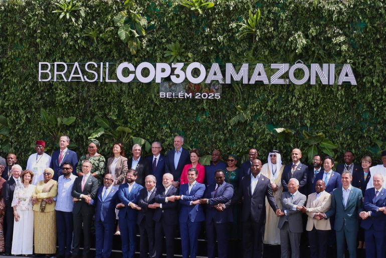 FAO Director-General QU Dongyu (second row, 3rd from right) pose for a family photo with world leaders during the 30th United Nations Climate Change Conference (COP30). ©FAO/ Max Valencia