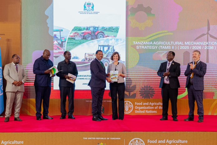 Prime Minister of the United Republic of Tanzania Mwigulu L. Nchemba with FAO Deputy Director-General Beth Bechdol launching the new national strategy on sustainable agricultural mechanization at the opening of the Africa Conference on Sustainable Agricultural Mechanization in Dar es Salaam. ©FAO