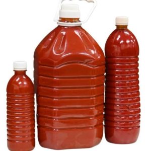 Photo caption: Palm oil displayed for sale at a local market. 1 