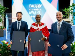(L–R) Jonas Stumpf, Managing Director of Help Logistics; Philip Koyei, Maasai Integrated Development Initiative (MIDI) and Ali Haddad, Executive Director of the Jordan Youth Innovation Forum, winners of the FAO Partnership Award, pose for a group photo at FAO's headquarters in Rome. ©FAO/Giuseppe Carotenuto