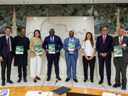 From left, Kaveh Zahedi, FAO Assistant Director-General and Director of the Office of Climate Change, Biodiversity and Environment (OCB), Seyni Nafo, Secretary General of the AAA Initiative, Çomoğlu Ülgen, Ambassador of the Republic of Türkiye to Italy, Bernard Kini Comoé, Minister Delegate for Food Crop Production of Côte d'Ivoire, Godfrey Magwenzi, FAO Deputy Director-General, Ghita el Ghorfi, Director General of the AAA Initiative, Youssef Balla, Ambassador of the Kingdom of Morocco to Italy and Permanent Representative to the United Nations Organisations in Rome, and Rattan Lal, Distinguished Professor of Soil Science, The Ohio State University, 2020 World Food Prize laureate, and AAA Scientific Committee member stand for a group photo holding the book “The State of African Agricultural adaption, 2016-2026 Assessment and Roadmap to 2036” during the High-Level Event Celebrating 10 Years of the AAA Initiative; FAO headquarters (King Faisal Room). ©FAO/Pier Paolo Cito